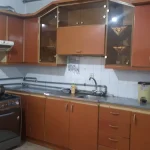 آشپزخانه با کابینت های قهوه ای آپارتمان در جویبار 7685476459